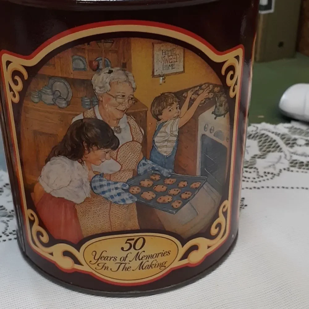 3-pc. Nestle's chocolate bundle: 2 vintage‎ tins and a hardcover cookbook